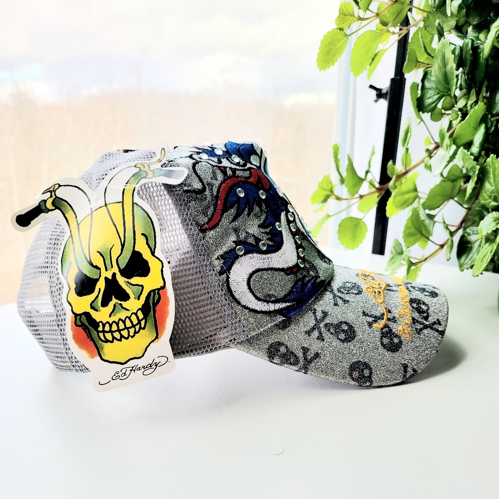 Rare, trucker hat featuring an Ed Hardy Skull w/ dragon rhinestone graphic.